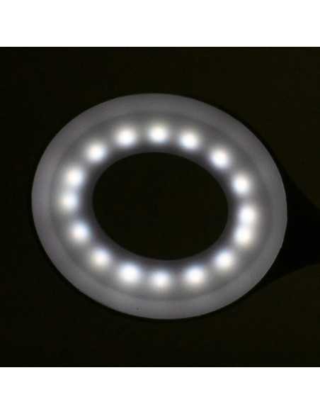 Lampe annulaire LED serpent sur le bureau blanc