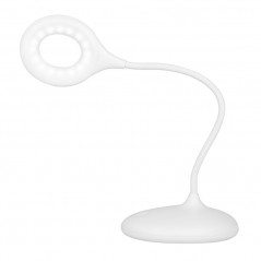 Lampe annulaire LED serpent sur le bureau blanc