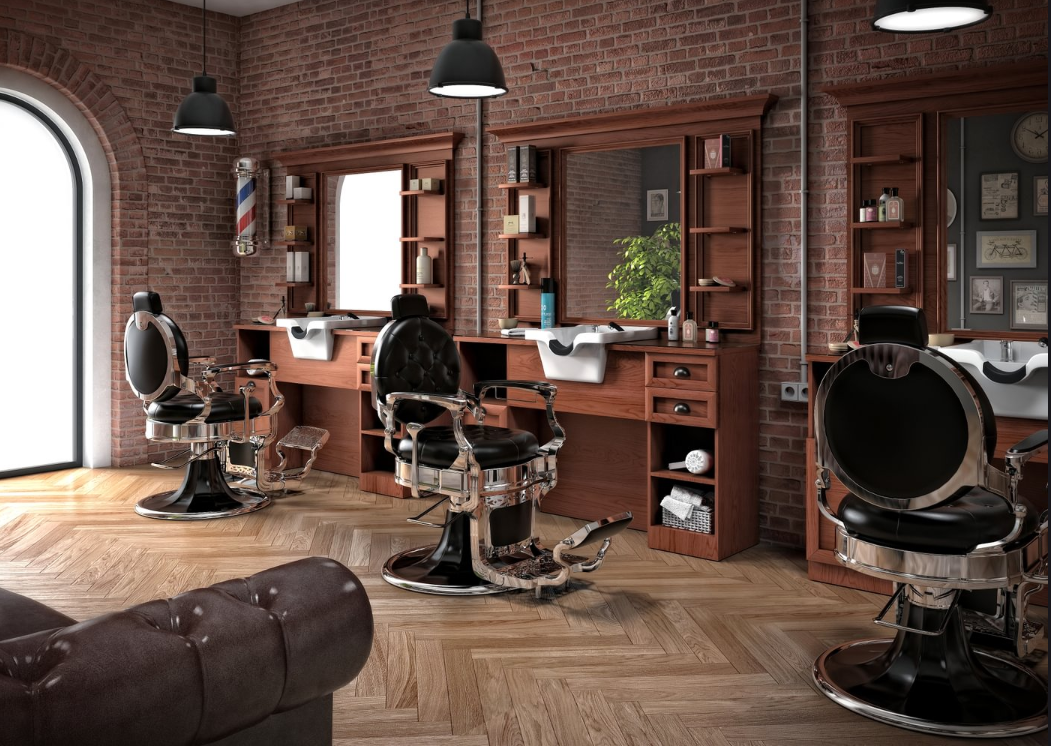 Postazione da barbiere in legno di noce installata in un negozio di barbiere con uno stile vintage ed elegante