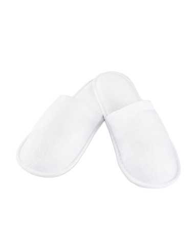 Slippers made entirely of white terry cloth